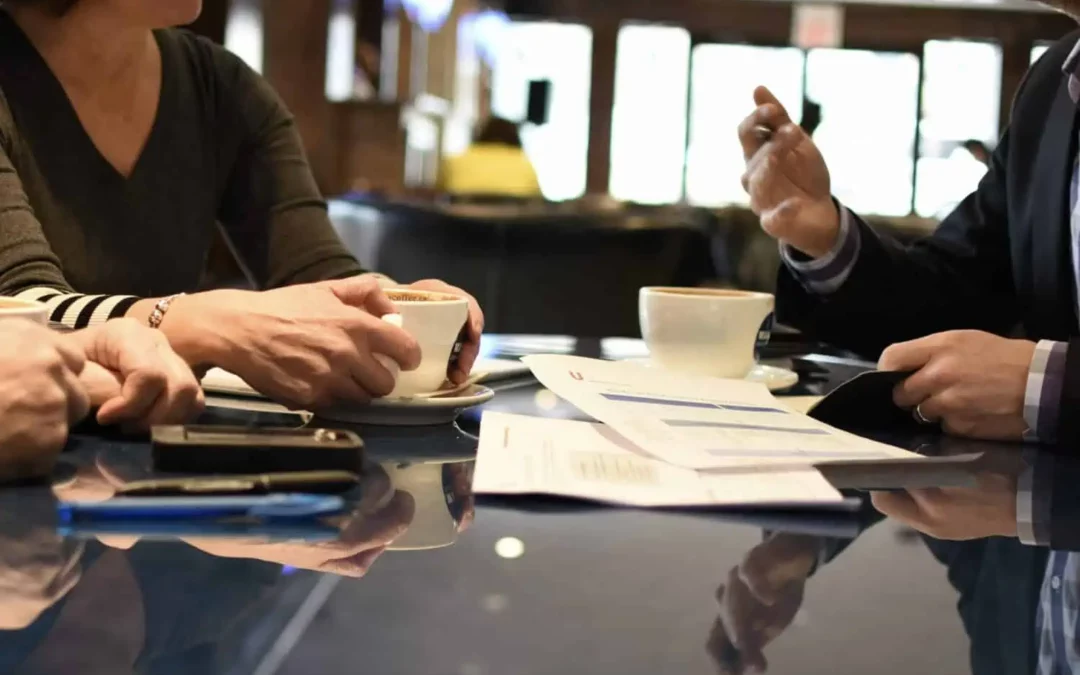 A Calgary home designer meets with a couple to discuss their needs for their new home.
