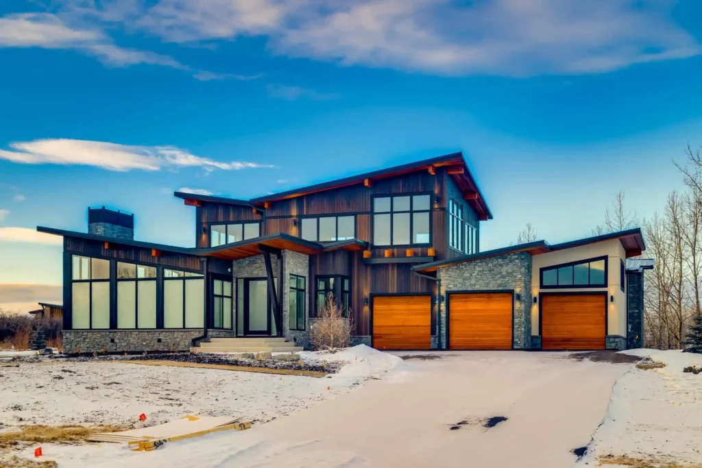 An acreage home in the winter after being built in the spring.